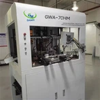 Máquina automática de bobinado y encintado de ganchos